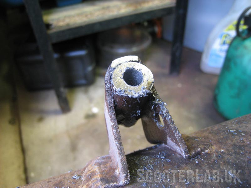 Drill to the correct size for tapping to M8 thread (6.75mm drill bit).