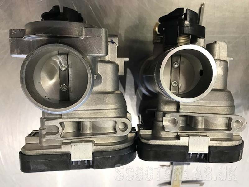 The image above shows the difference between a stock 32mm (right) and uprated 38mm (left) ECU throttle body