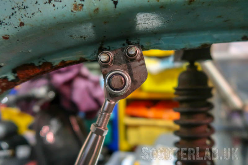 Handmade brackets for the turnbuckle bolt to the HT coil mount on the frame.