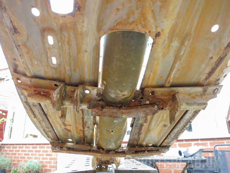 Bodged strut repairs with bits of bent steel and massive gaps on one side