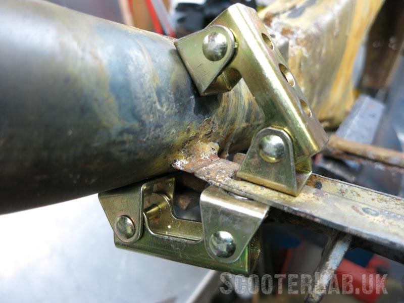 These hinged magnetic welding clamps (from eBay) are very useful for holding parts in position for welding.