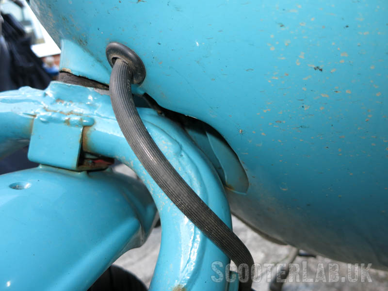 The legshields need cut-outs to allow the Honda forks to turn