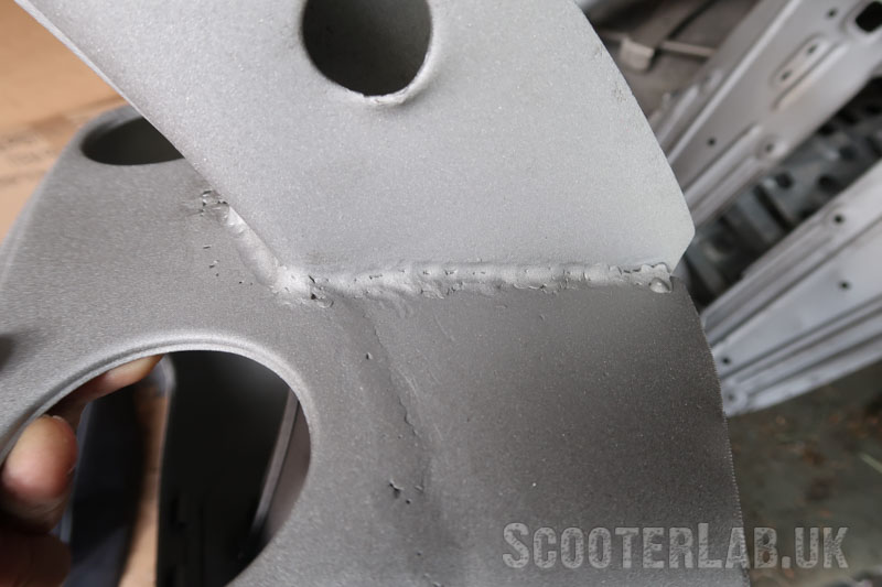 Pin-holes and lumpy welds still remain