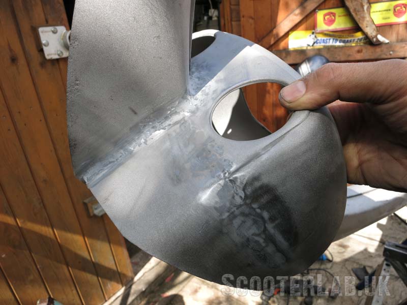JB Weld is sanded back prior to powder coating.