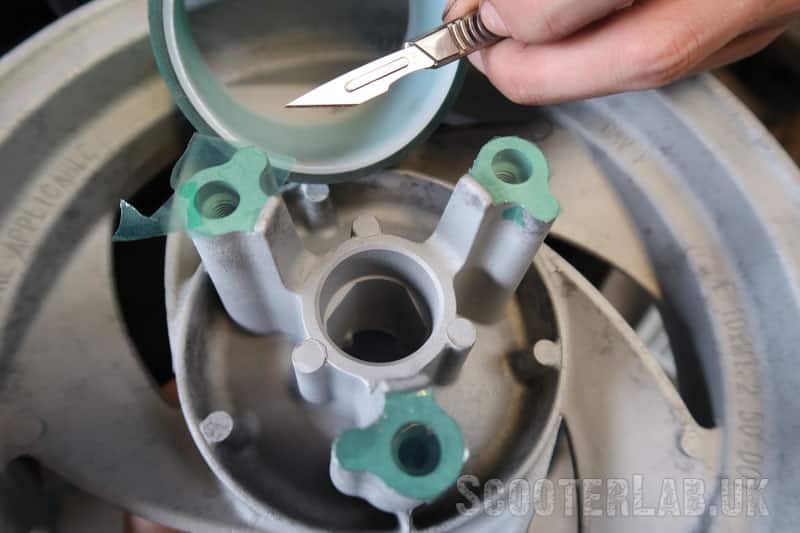 Masking the front disc mounting points with special heat-resistant tape