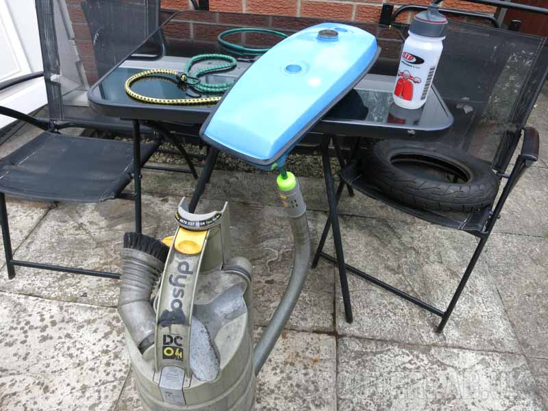 Hoovering sand out of the fuel tank; not totally successfully