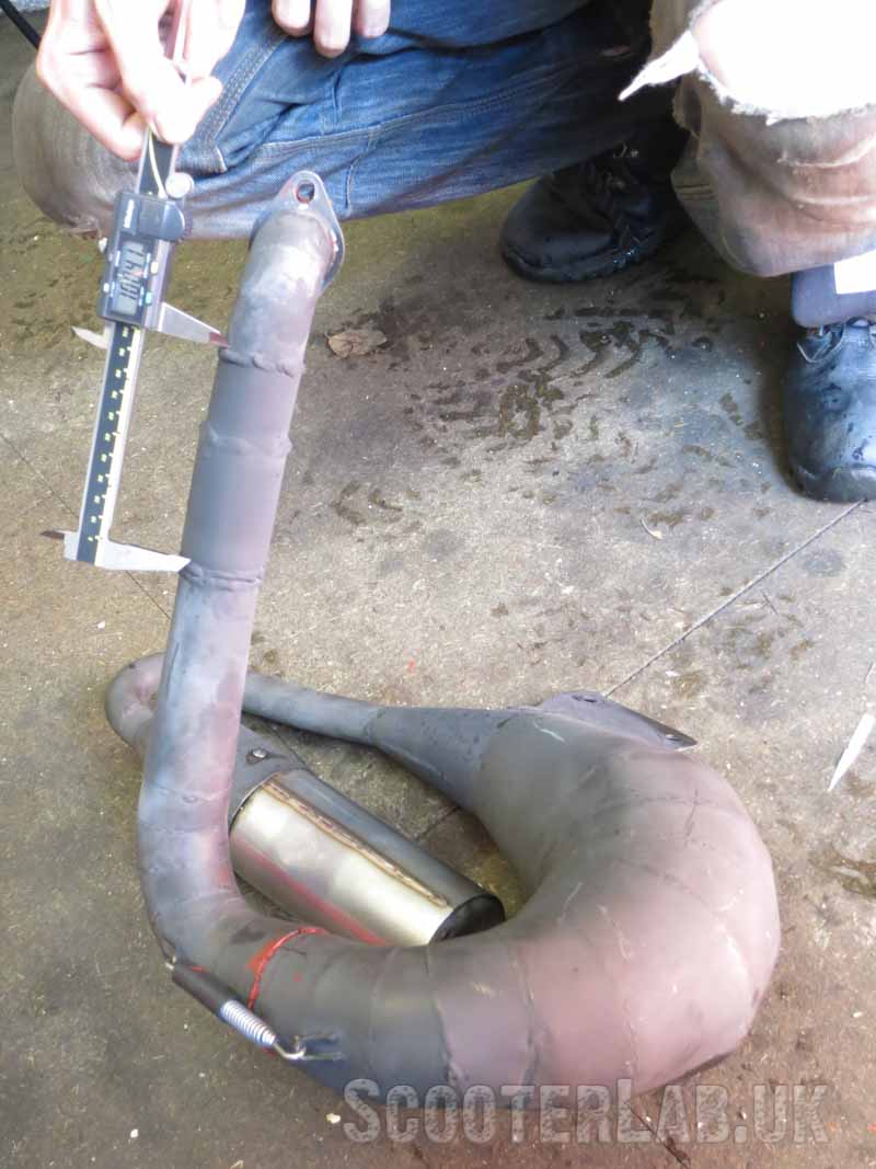 100mm of extra length added to the downpipe