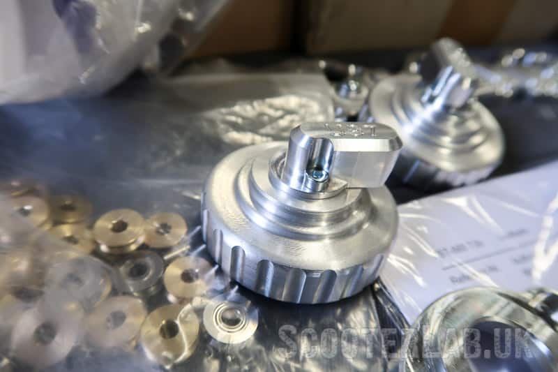 CNC carb top adapters including a wheel and 90-degree cable entry for various carburettors