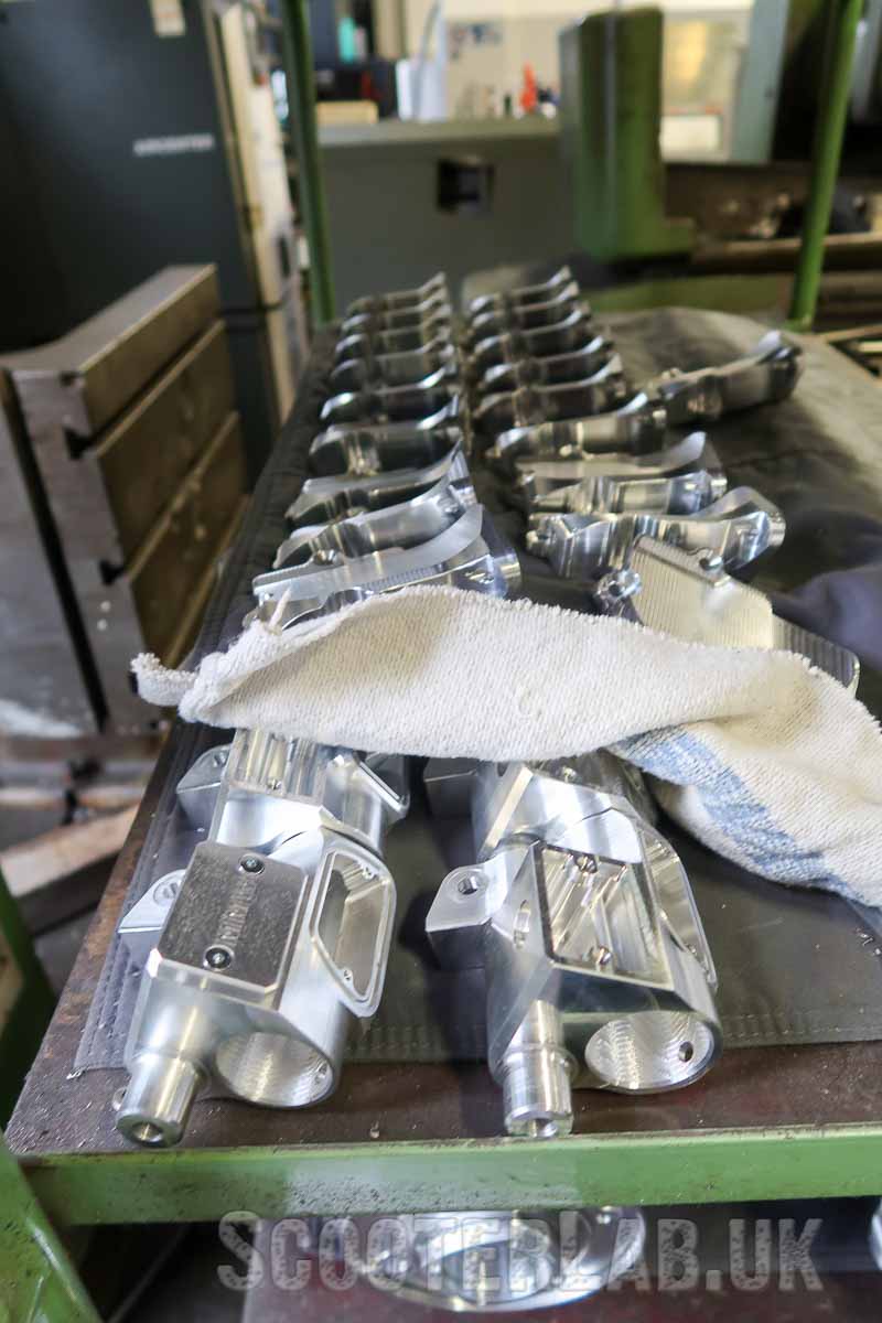 A selection of MMW handlebar pumps for Lambretta and 'Linke Nummer' left-hand inlet manifolds for the TS1 kit.