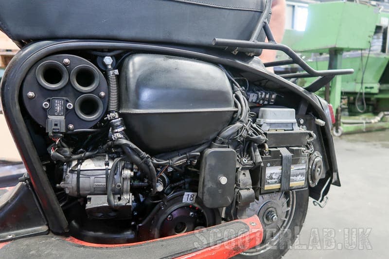 To the left is the air-box with MAP sensor and below it is the fuel pump.