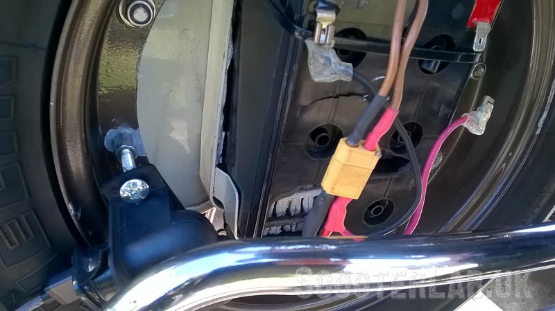 Nice Hole in the side of the battery, now without its acid