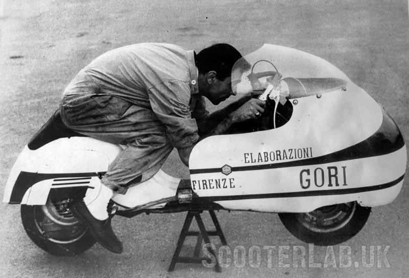 Yes, that's a cut-down Vespa SS90 under the dustbin fairing