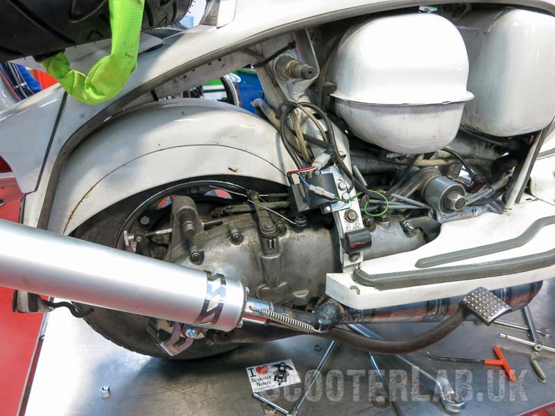 You can confirm where to trim the running board by removing the rear shock
