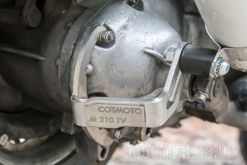 Rear muffler support hangs off three chaincase studs