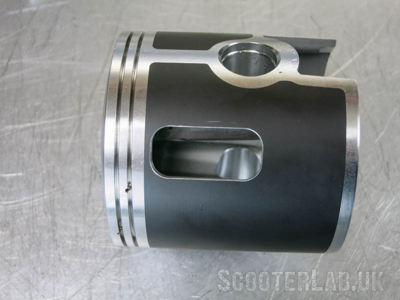 The boost port is fed by a slot in the piston.