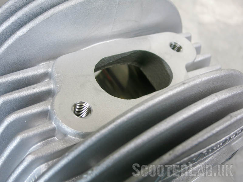 The exhaust studs holes in the aluminium cylinder are fitted with steel thread inserts to reinforce them. This is a good idea when the threads are so shallow.
