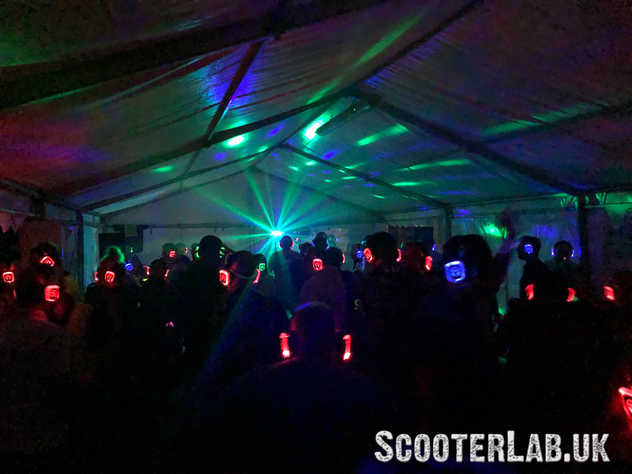 Darkside tent at Mersea Island, silent disco with multi coloured headphones.